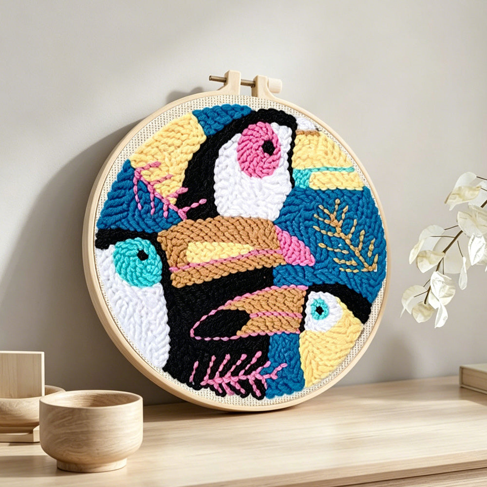 Colourful tropical toucan punch needle artwork displayed on a table