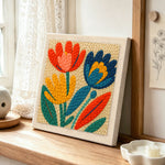 Colourful tulips punch needle artwork displayed on a table