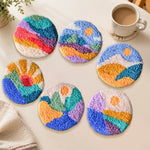 Colourful valley and sunrise punch needle coasters used for home decoration