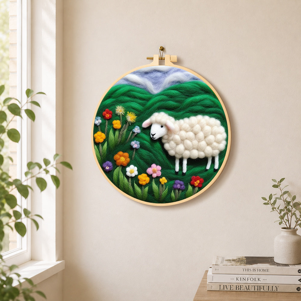 Colourful wildflower meadow with a sheep needle felt wall art displayed in a bright home interior