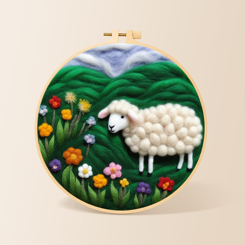 Colourful wildflower meadow with a sheep needle felting kit for beginners with a round wooden frame