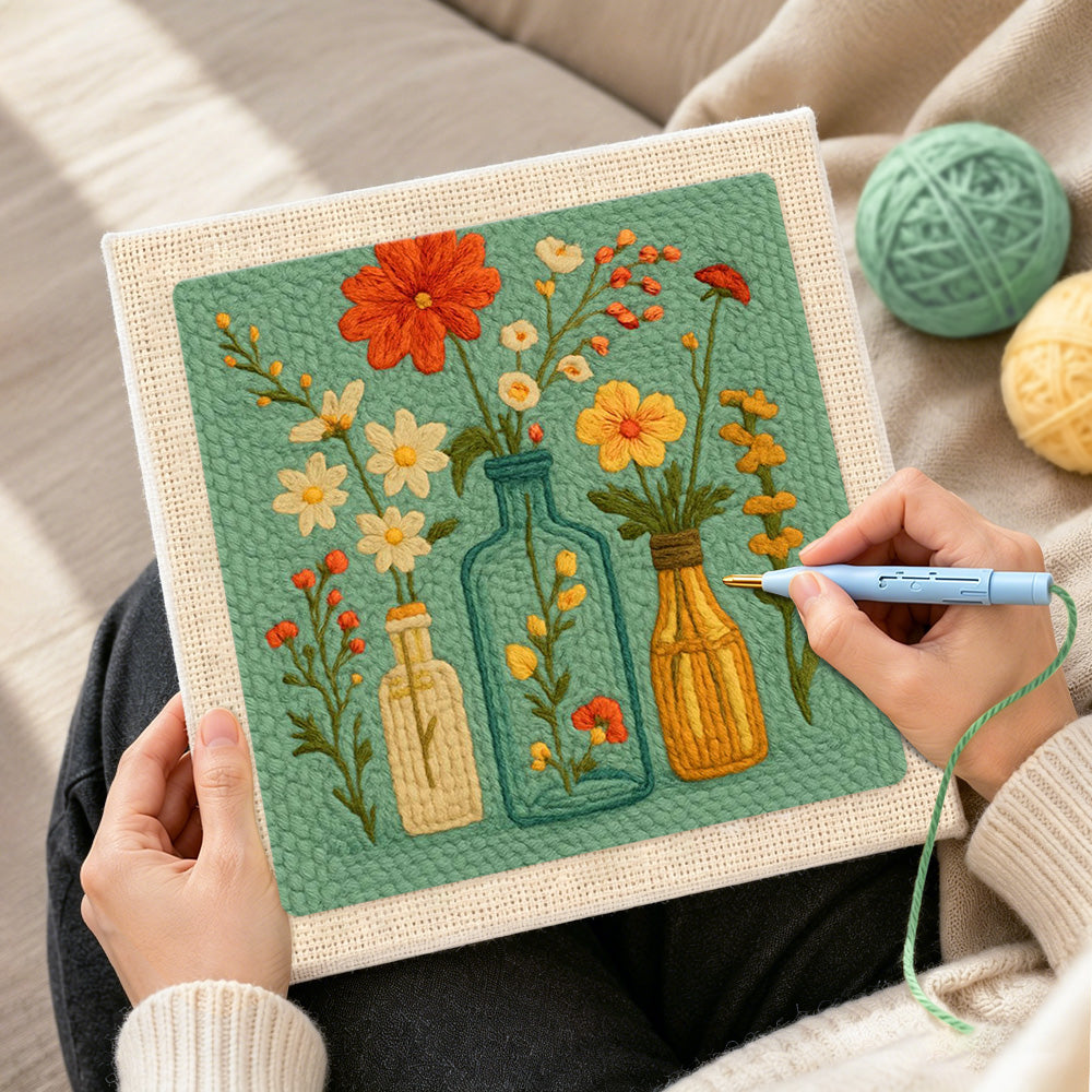 Creating handmade colourful wildflowers in the glass bottles punch needle artwork