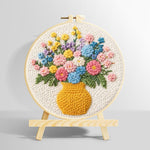 Colourful wildflowers in yellow vase punch needle kit for beginners