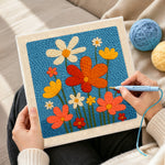 Creating handmade colourful wildflowers punch needle artwork