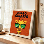 Cool giraffe with glasses punch needle artwork displayed on a table