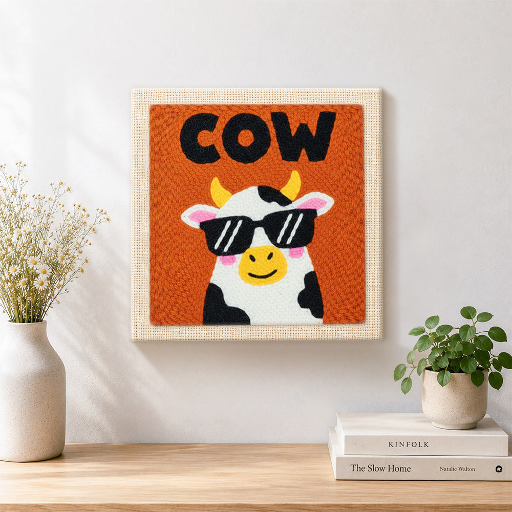 Finished cool sunglasses cow artwork displayed on a wall