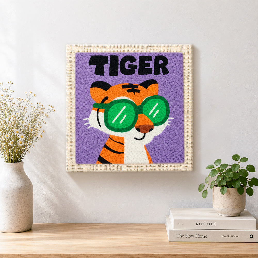 Finished cool "TIGER" with green sunglasses artwork displayed on a wall