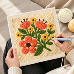 Creating handmade coral and yellow florals punch needle artwork