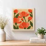 Finished coral pink flowers artwork displayed on a wall