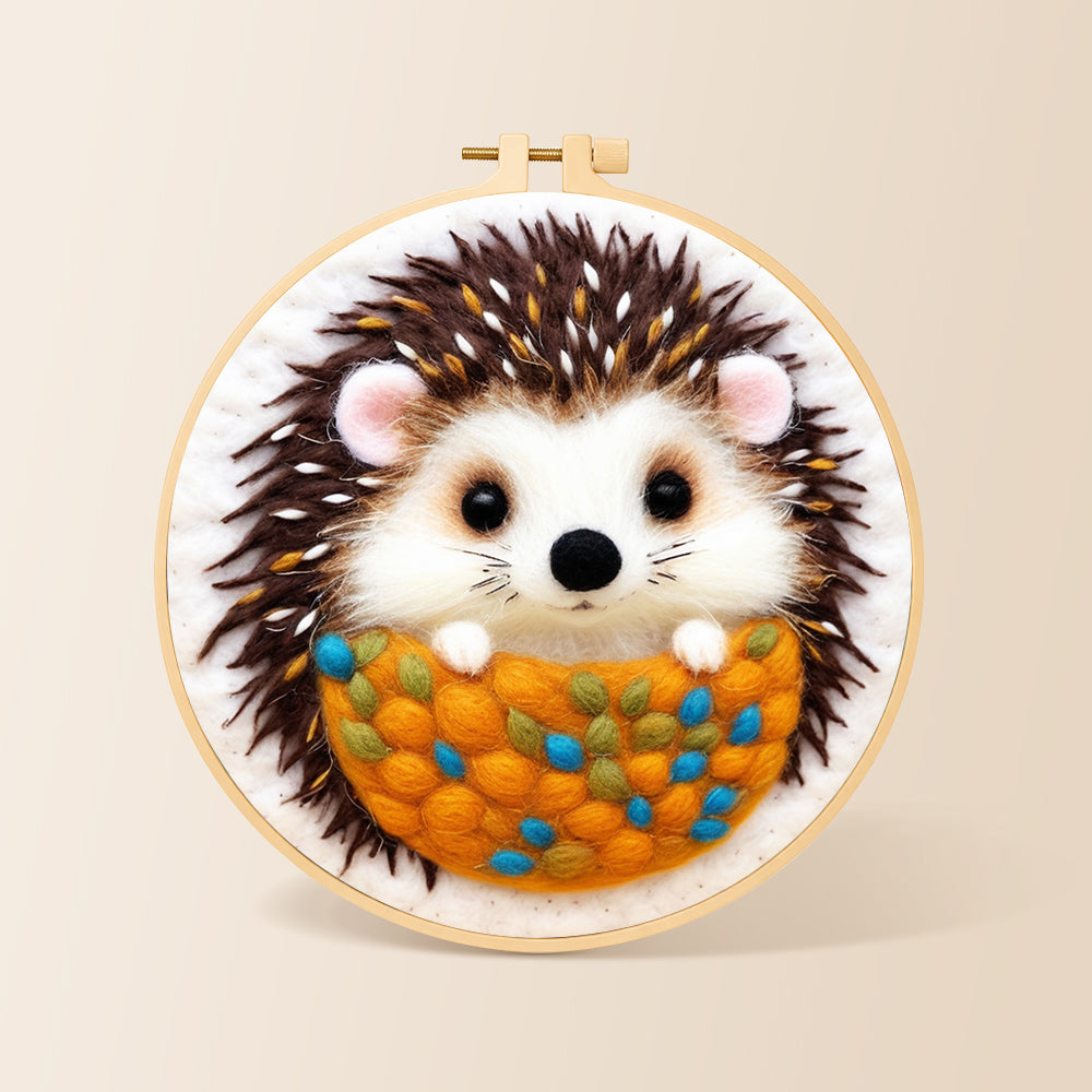 Cosy hedgehog needle felting kit for beginners with a round wooden frame