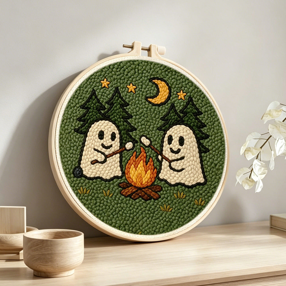 Cosy night camping ghosts punch needle artwork displayed on a table