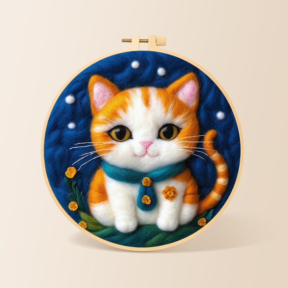 Cosy orange cat with teal bow tie needle felting kit for beginners with a round wooden frame