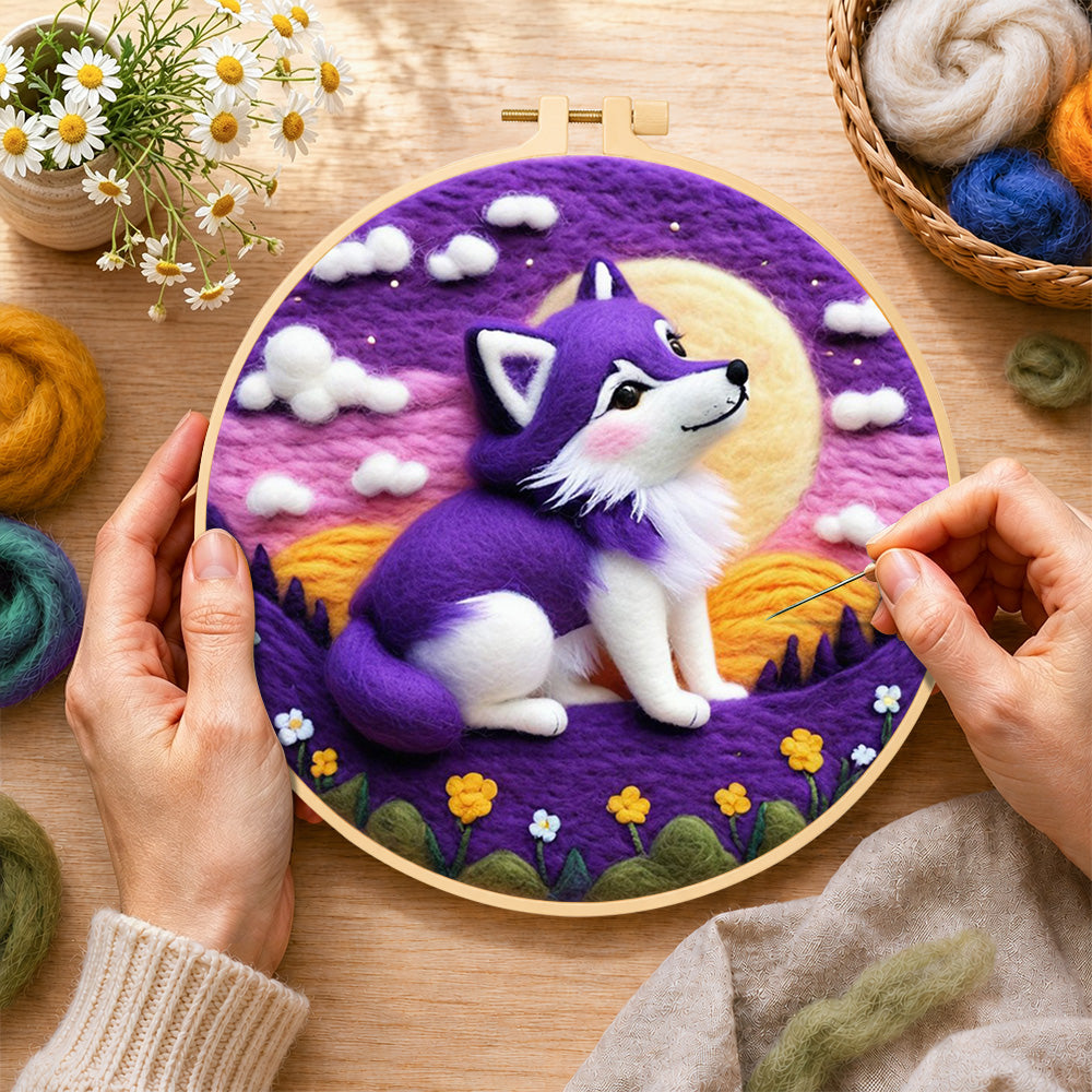 Creating the cosy purple wolf under the moon wool painting by hand with a felting needle