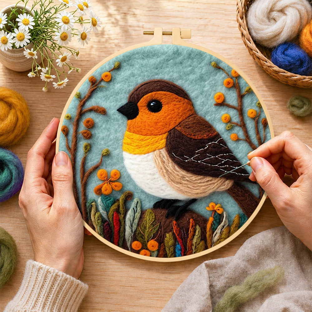 Creating the cosy woodland bird wool painting by hand with a felting needle