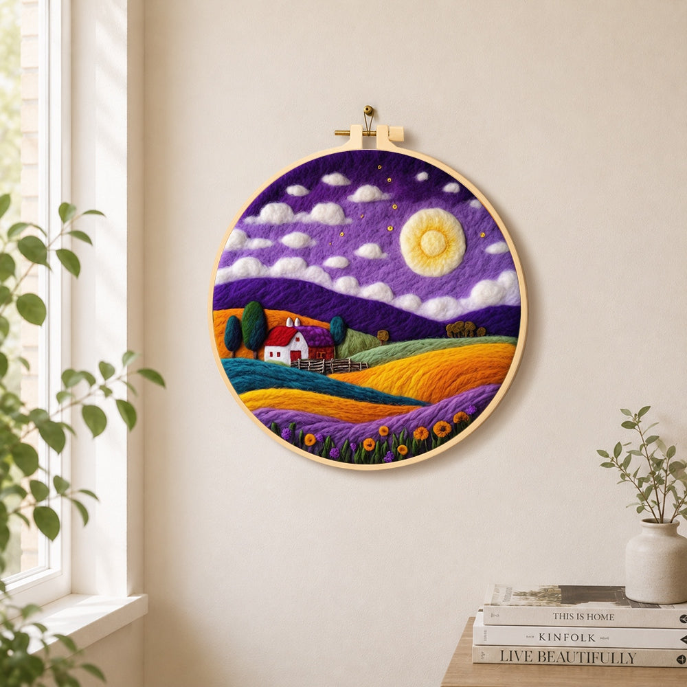 Cottage under the mystical purple night needle felt wall art displayed in a bright home interior