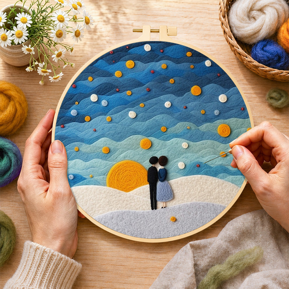 Creating the couple under the calming blue starry sky wool painting by hand with a felting needle