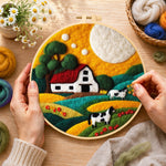 Creating the cows and farm life wool painting by hand with a felting needle