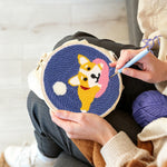 Creating handmade cozy dog punch needle artwork