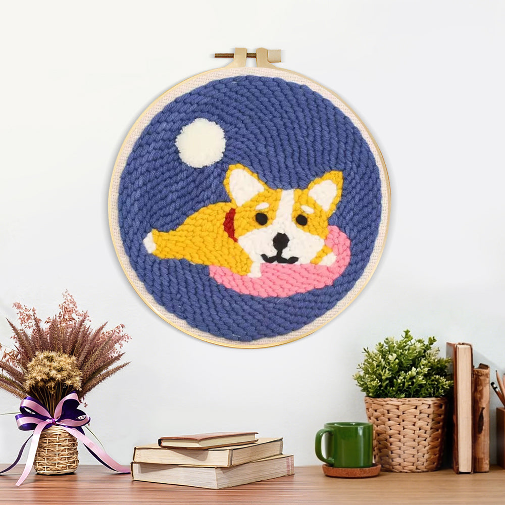 Finished cozy dog artwork displayed on a wall
