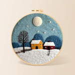 Cozy village on a snowy night needle felting kit for beginners with a round wooden frame