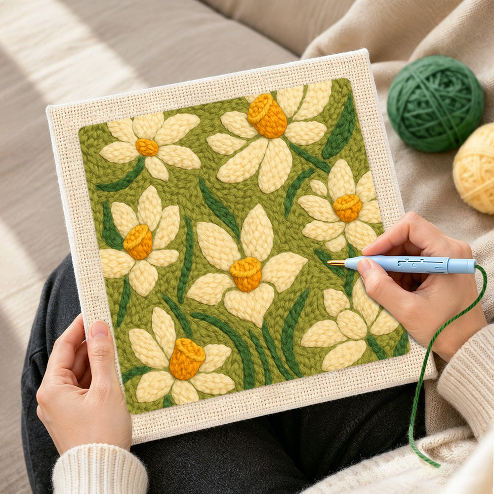 Creating handmade creamy white daffodil punch needle artwork