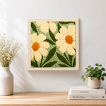 Finished creamy white daisy flowers artwork displayed on a wall