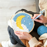 Creating handmade crescent moon and stars punch needle artwork