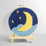 Crescent moon over starry night sky punch needle kit for beginners