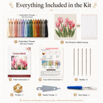 Cross stitch kit includes embroidery threads, canvas, instructions and stitching tools