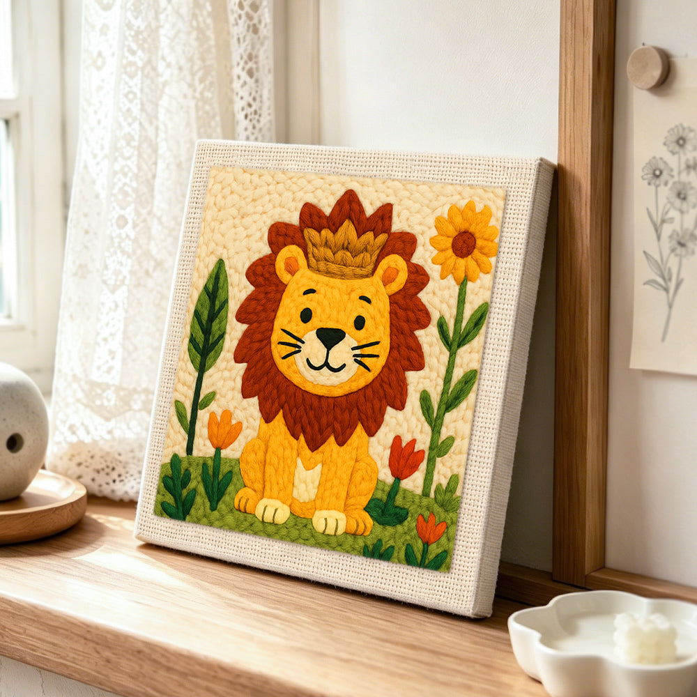 Crowned lion and flowers punch needle artwork displayed on a table
