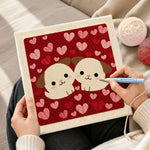 Creating handmade cuddling puppy duo punch needle artwork