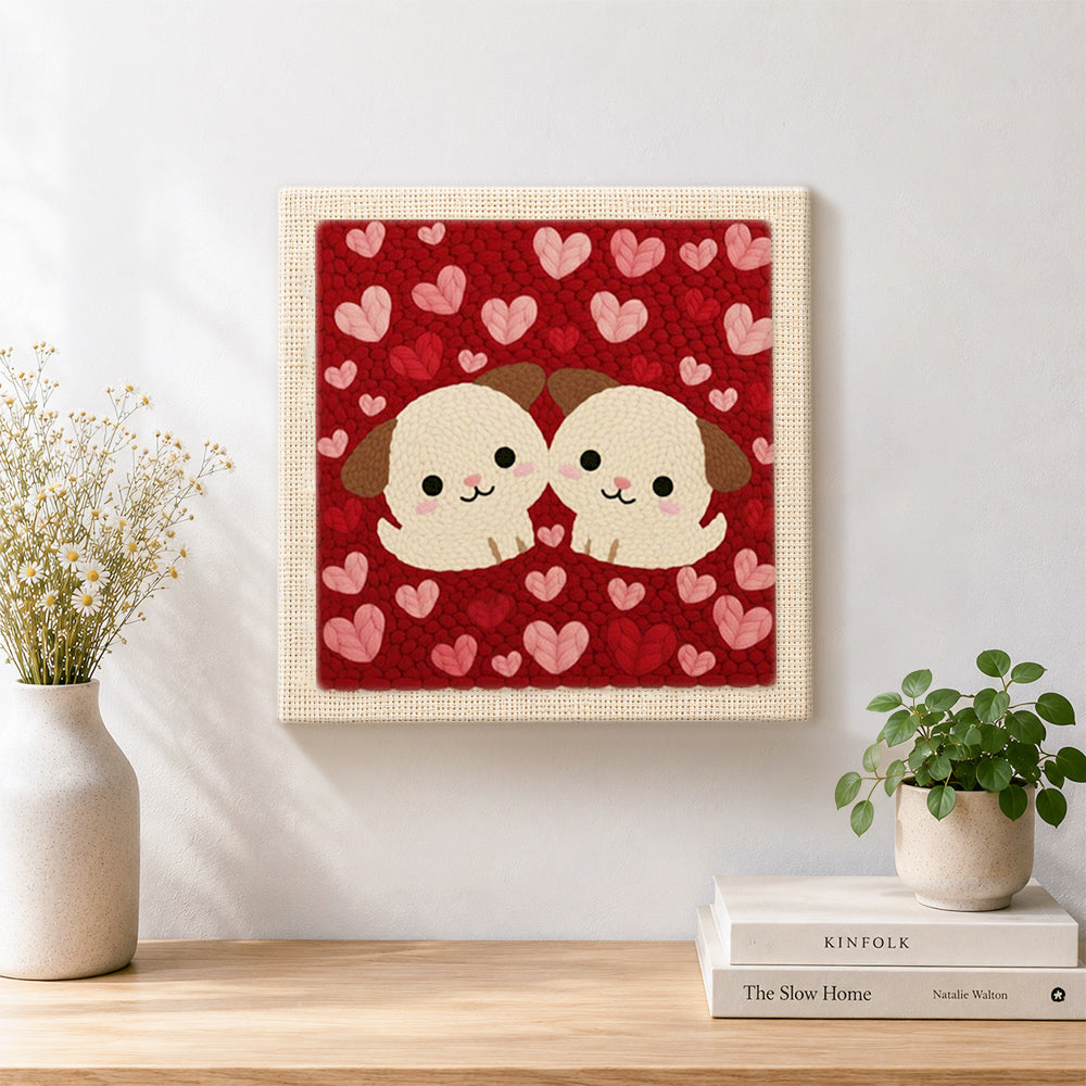 Finished cuddling puppy duo artwork displayed on a wall