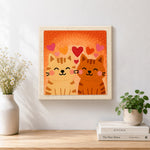 Finished cuddling tabby cat couple artwork displayed on a wall
