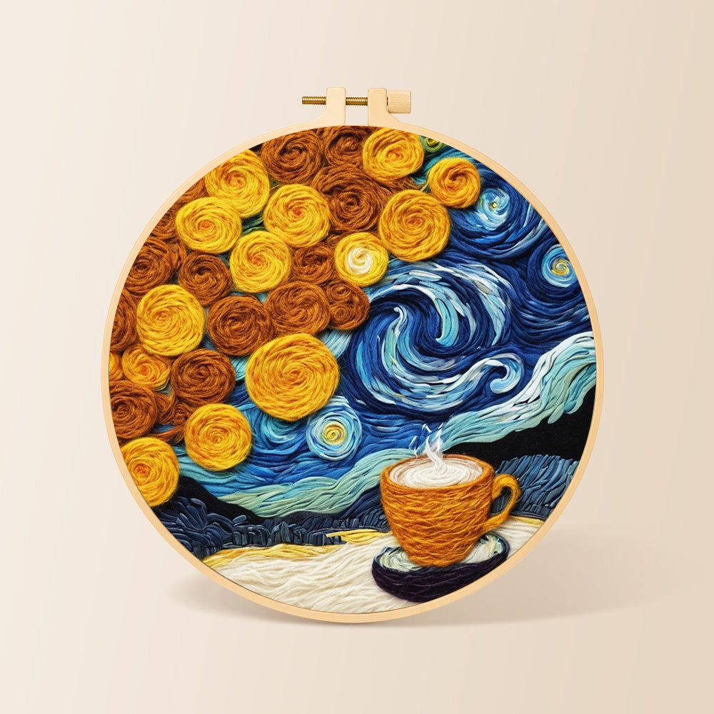 Cup of coffee under a swirling starry sky needle felting kit for beginners with a round wooden frame