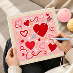 Creating handmade cupid's arrow target heart punch needle artwork