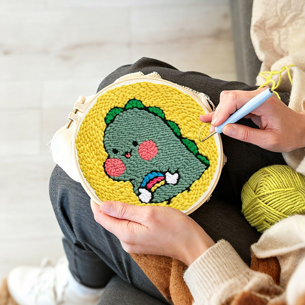 Creating handmade cute baby dinosaur punch needle artwork