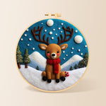 Cute baby reindeer sitting in the snow needle felting kit for beginners with a round wooden frame