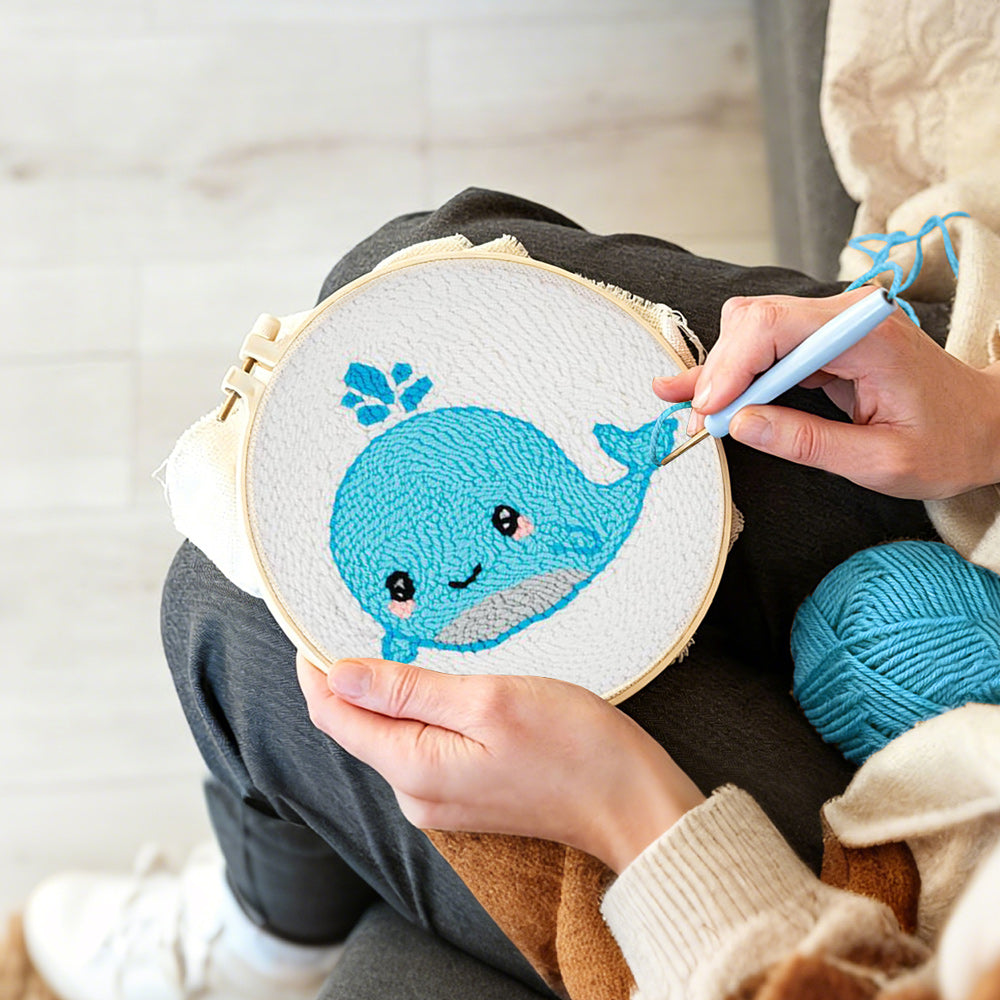 Creating handmade cute baby whale punch needle artwork