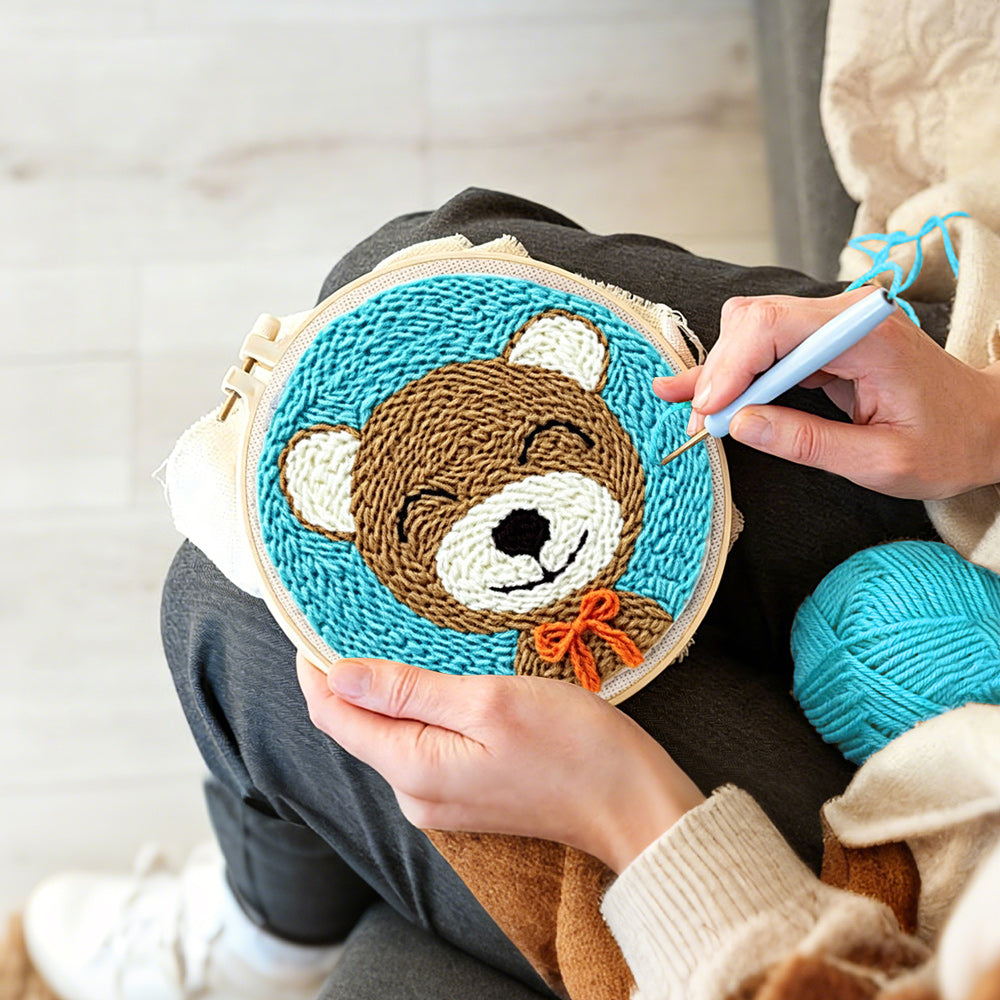 Creating handmade cute bear with orange bow tie punch needle artwork