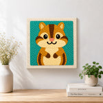 Finished cute big-eyed chipmunk artwork displayed on a wall