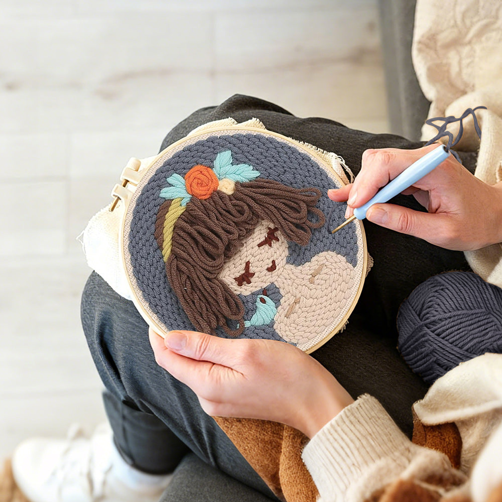 Creating handmade cute brown haired girl punch needle artwork