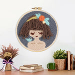 Finished cute brown haired girl artwork displayed on a wall