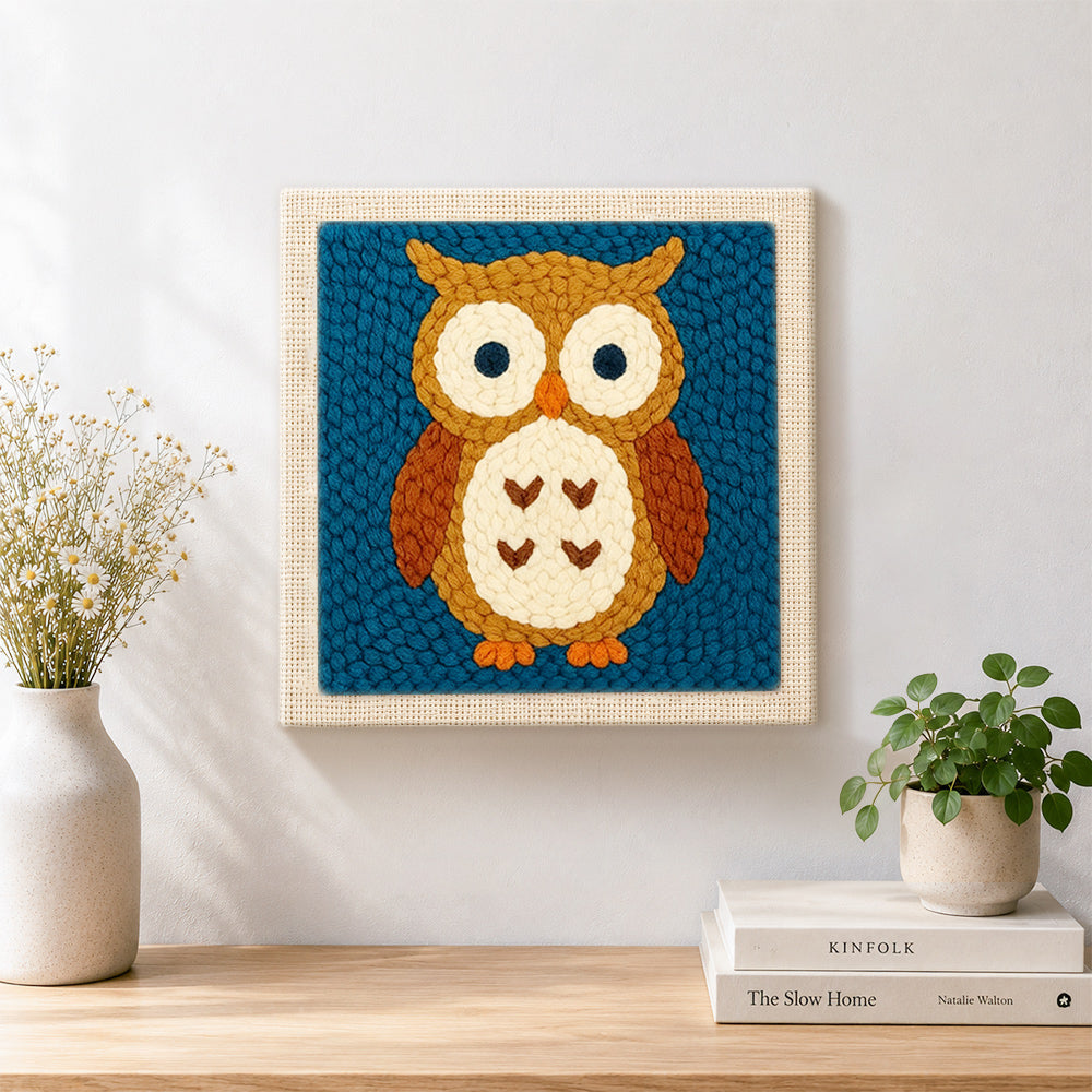 Finished cute brown owl artwork displayed on a wall