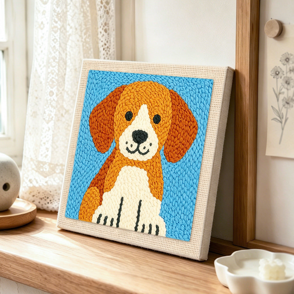 Cute brown puppy punch needle artwork displayed on a table
