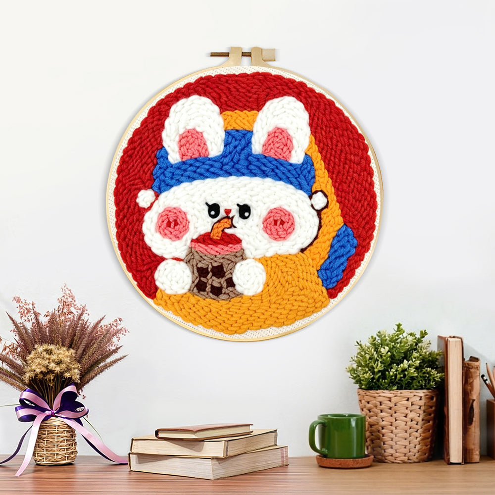 Finished cute bunny drinking boba artwork displayed on a wall
