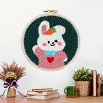 Finished cute bunny in pink outfit artwork displayed on a wall