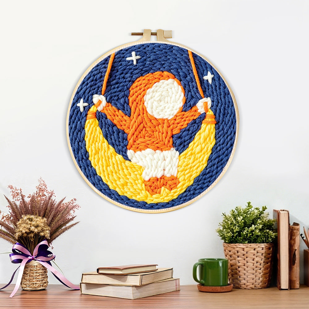 Finished cute child on a moon swing artwork displayed on a wall