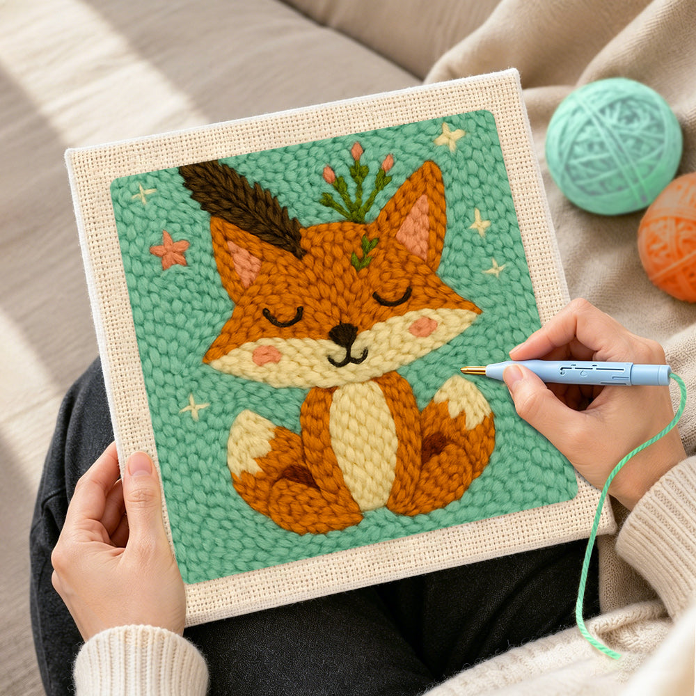 Creating handmade cute fox with feathers and sprigs punch needle artwork