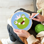Creating handmade cute frog with crown punch needle artwork