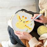 Creating handmade cute giraffe punch needle artwork